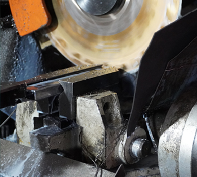 Precision cutting of hardware components, showcasing DELTA CAINA's advanced manufacturing processes for high-quality and durable furniture hardware solutions.